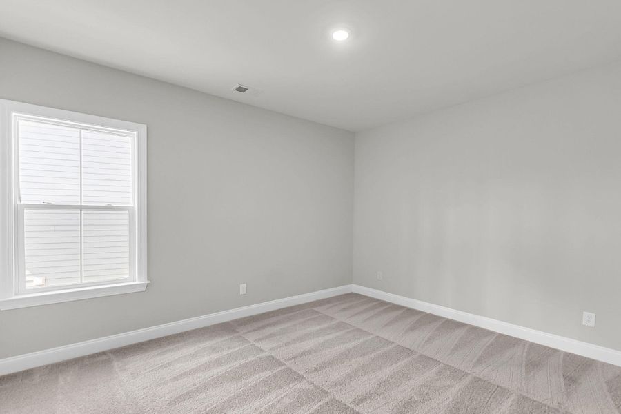 Spacious, unfurnished interior of a new home in Tidewater at Lakes of Cane Bay, Summerville (Image 34). Spacious, unfurnished interior of a new home in Tidewater at Lakes of Cane Bay, Summerville (Image 34).