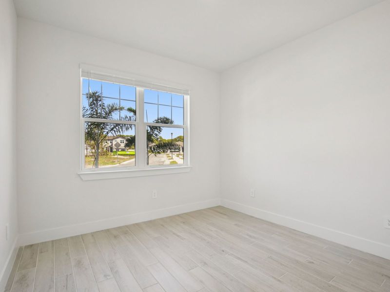 Spacious, unfurnished interior of a new home in Magnolia Bay - Reserve Series, Nokomis (Image 11).
