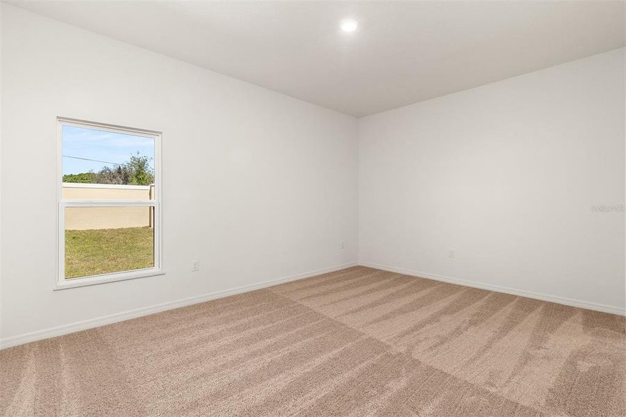 Spacious, unfurnished interior of a new home in Peach Crossings, Winter Haven (Image 16). Spacious, unfurnished interior of a new home in Peach Crossings, Winter Haven (Image 16).
