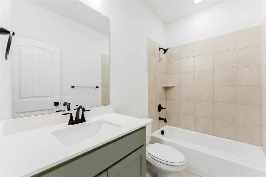 Full bathroom featuring bathtub / shower combination and vanity
