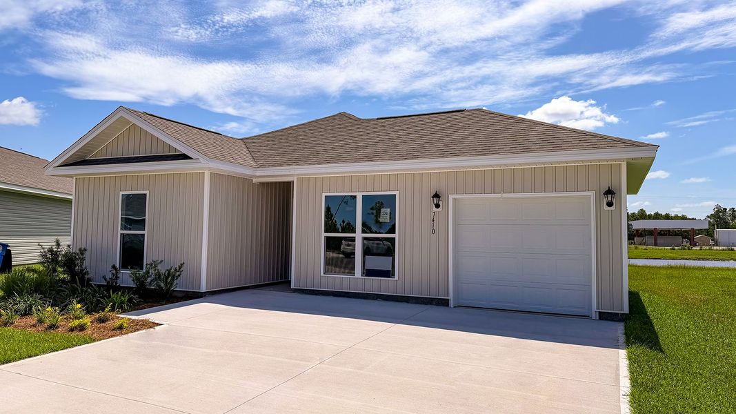 Front exterior of a new home in Liberty, Panama City, FL, highlighting curb appeal (Image 2). Front exterior of a new home in Liberty, Panama City, FL, highlighting curb appeal (Image 2).