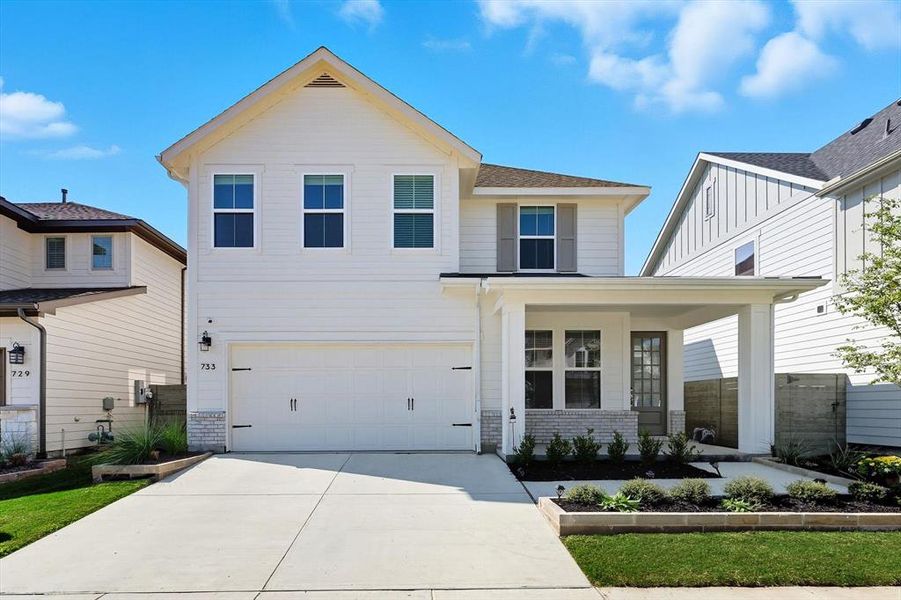 Front exterior of a new home in , Argyle, TX, highlighting curb appeal (Image 23). Front exterior of a new home in , Argyle, TX, highlighting curb appeal (Image 23).