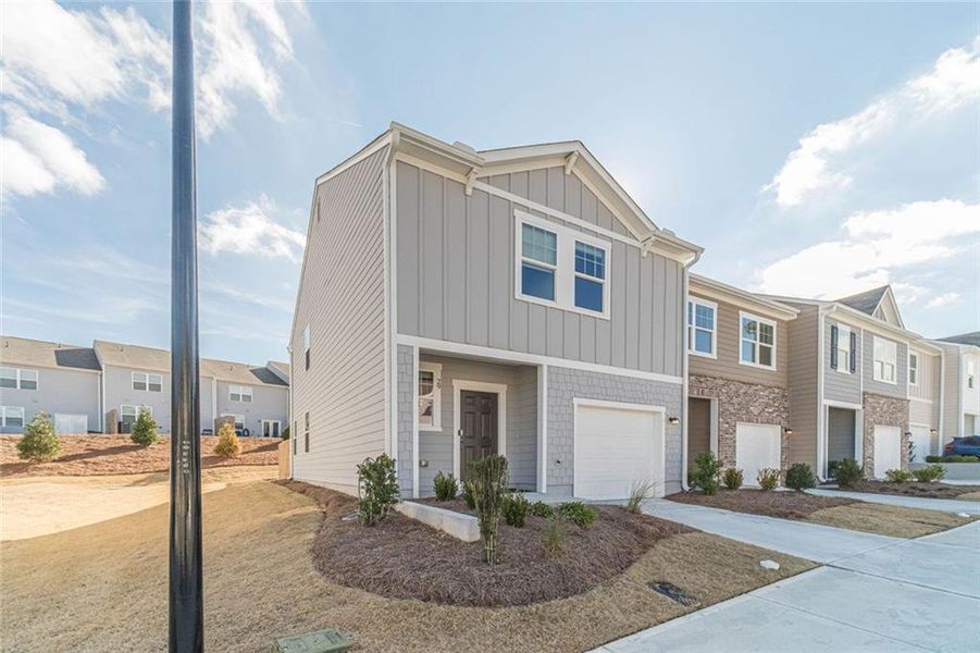 Front exterior of a new home in , Winder, GA, highlighting curb appeal (Image 17).