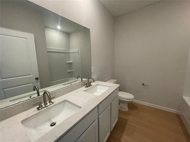 Furnished interior view inside a new home in Magnolia Series at Seminole Palms, Palm Coast (Image 4). Furnished interior view inside a new home in Magnolia Series at Seminole Palms, Palm Coast (Image 4).