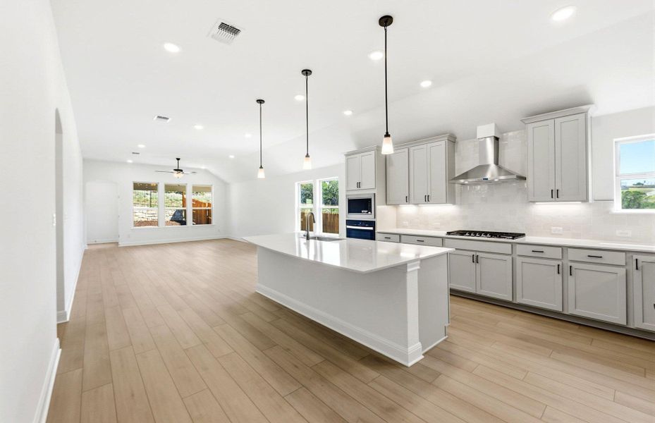 Furnished interior view inside a new home in West Cypress Hills, Spicewood (Image 5).