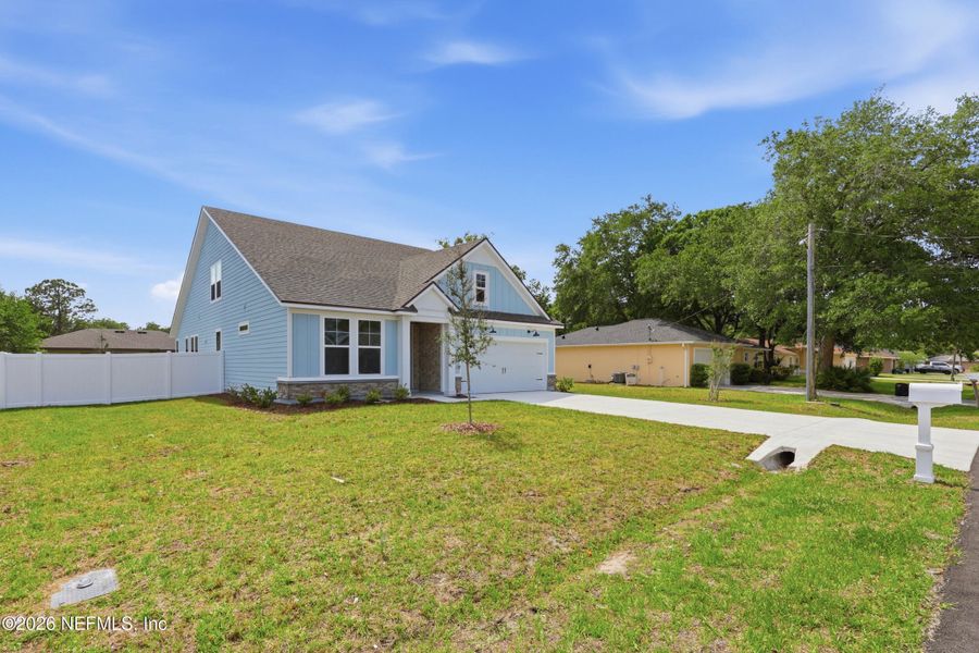 Exterior details and patio area of a home in Palm Coast Homes, Palm Coast (Image 32).