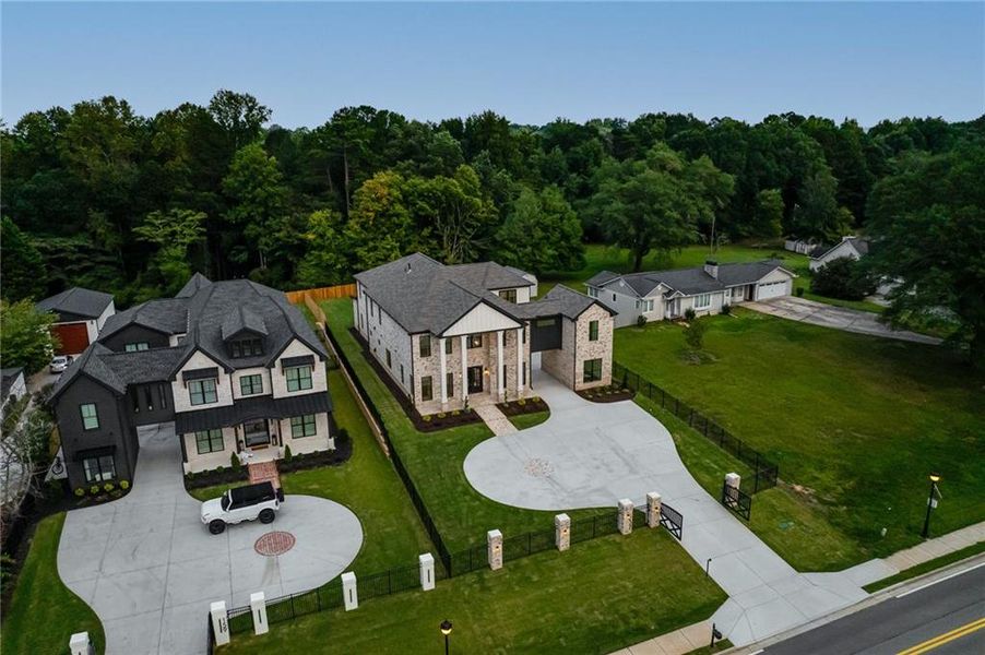 Front exterior of a new home in , Buford, GA, highlighting curb appeal (Image 24). Front exterior of a new home in , Buford, GA, highlighting curb appeal (Image 24).