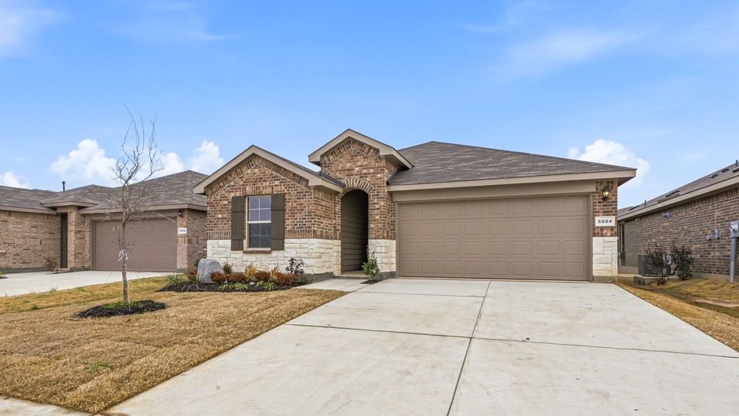 Representative exterior photo of a completed home built from the Easton by D.R. Horton in Hickory Grove, Krum, TX (Image 2).