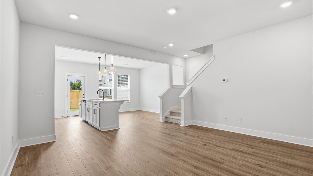Spacious family room with accomplished design and eye-catching details throughout at the Barton Hollow community Spacious family room with accomplished design and eye-catching details throughout at the Barton Hollow community