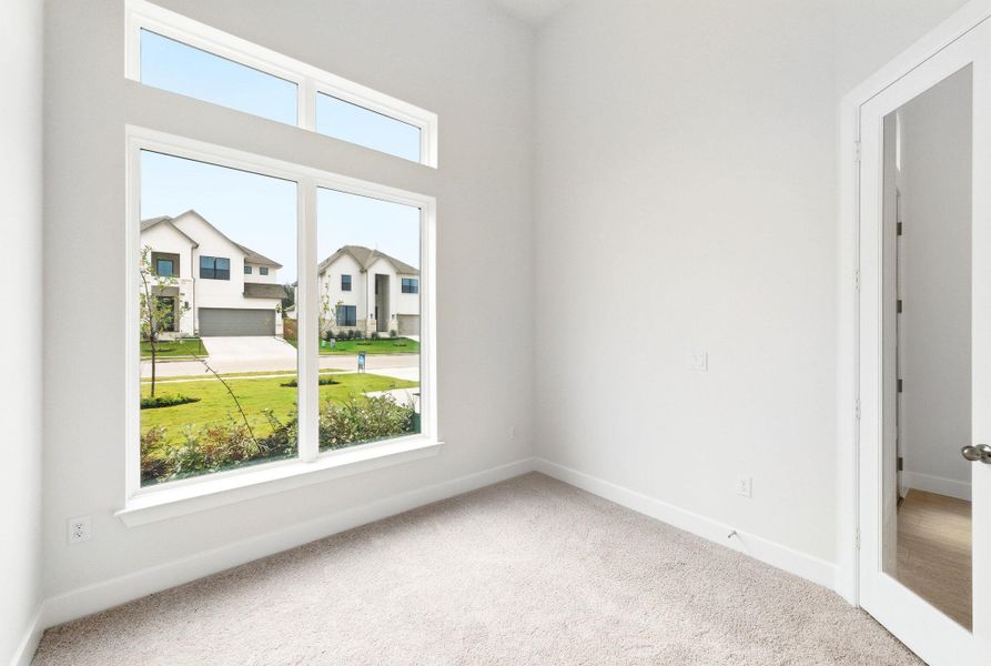 Spacious, unfurnished interior of a new home in The Colony, Bastrop (Image 16).
