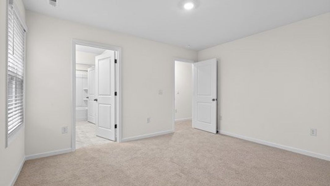 Representative unfurnished interior of a home built from the Tillery by D.R. Horton in The Estates Park, Apex (Image 35).