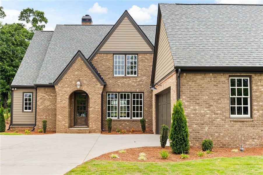 Front exterior of a new home in , Carrollton, GA, highlighting curb appeal (Image 29).