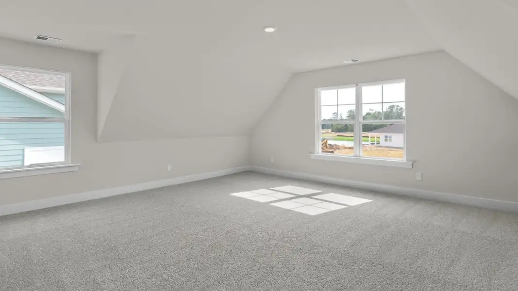 Representative unfurnished interior of a home built from the Forrester by D.R. Horton in The Highlands at Cedar Hill Landing, Navassa (Image 36).