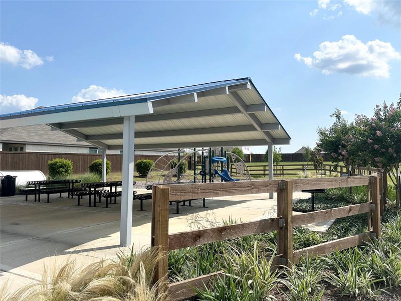 Front exterior of a new home in Colony at Pinehurst, Pinehurst, TX, highlighting curb appeal (Image 1). Front exterior of a new home in Colony at Pinehurst, Pinehurst, TX, highlighting curb appeal (Image 1).