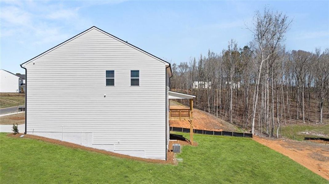 Exterior details and patio area of a home in Kingston Ranch at Lake Oconee, Buckhead (Image 23).