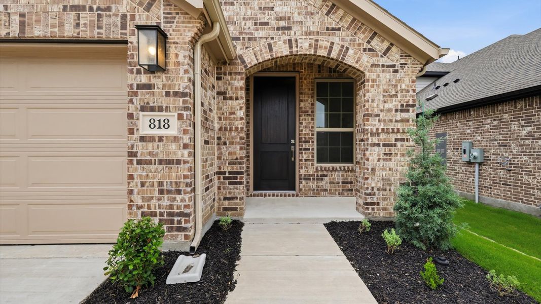 Exterior details and patio area of a home in Westridge Journey, Princeton (Image 3).