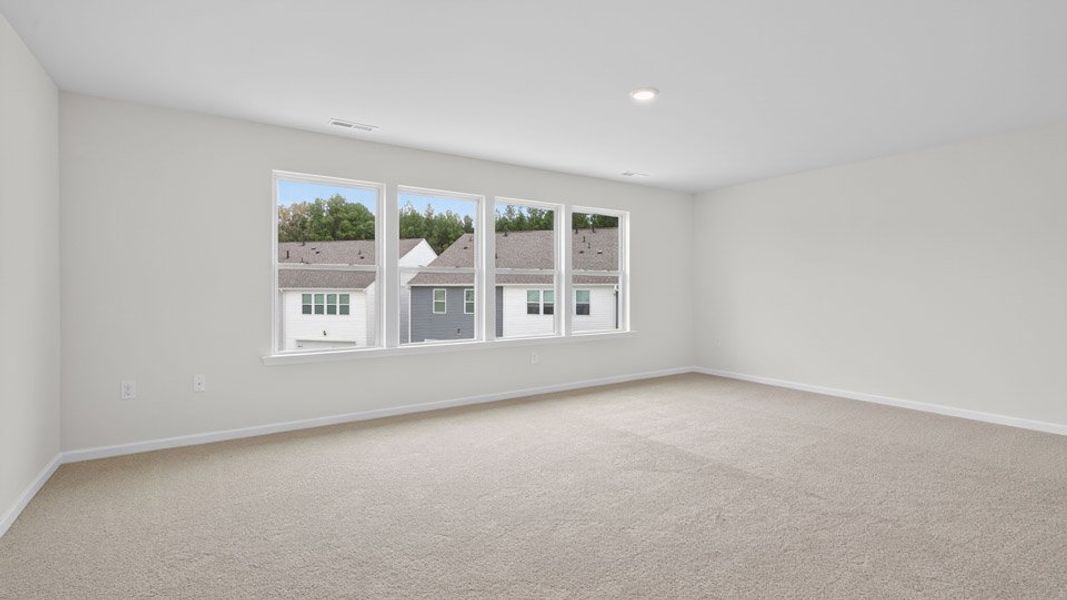 Spacious, unfurnished interior of a new home in The Townes at Anderson Farm, Wendell (Image 24).