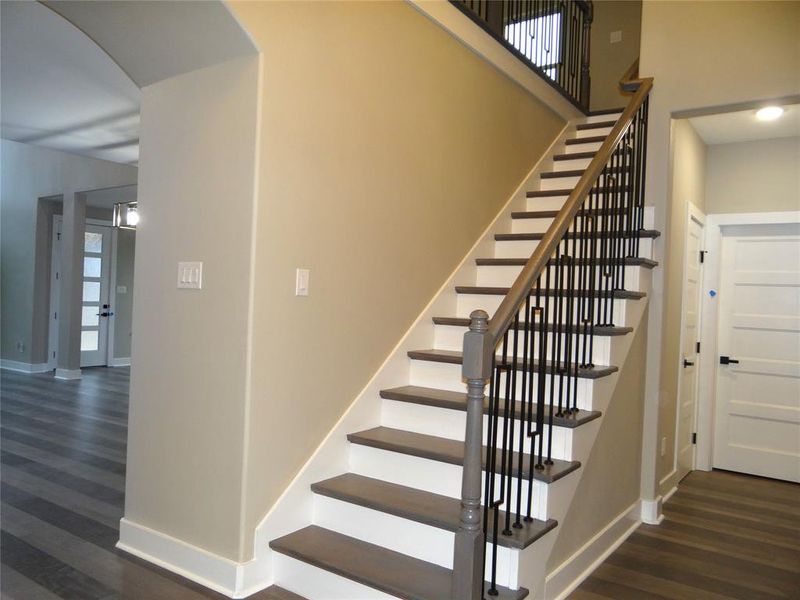 Stairway featuring laminate flooring