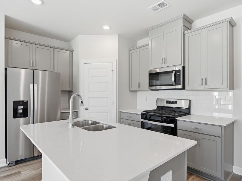 Furnished interior view inside a new home in Northbrook Village Townes, Taylors (Image 4).
