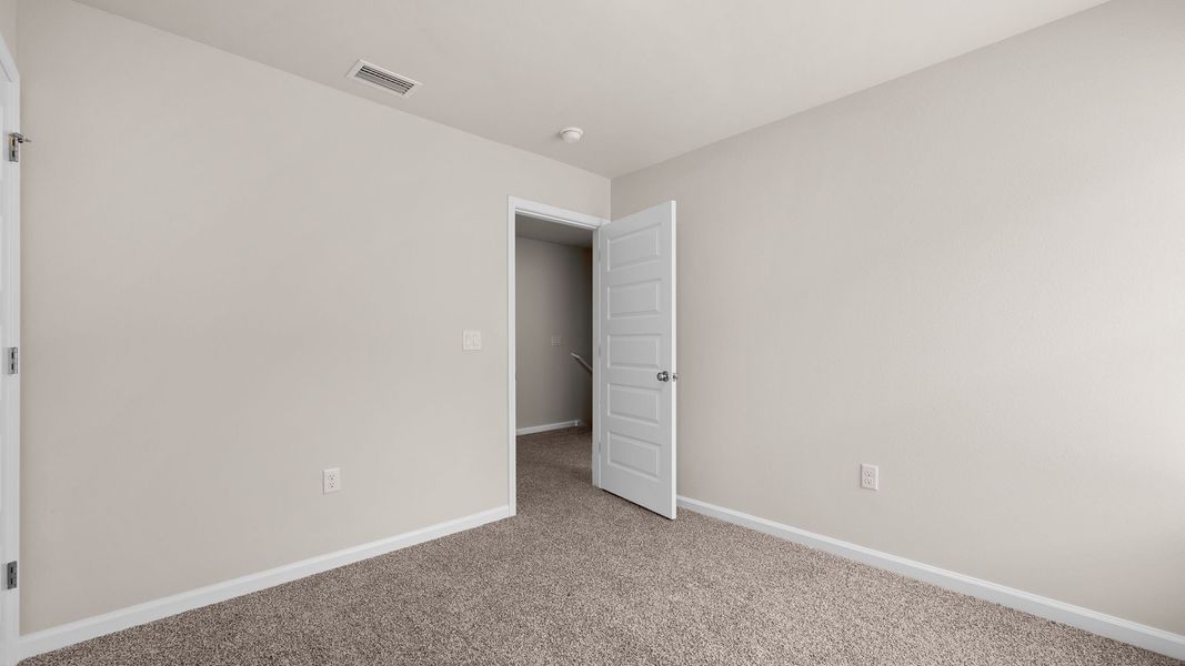 Representative unfurnished interior of a home built from the The Canmore by D.R. Horton in Salt Pines, Port Saint Joe (Image 33).