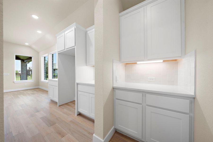 Versatile flex space with built-in cabinetry and ample natural light — perfect for a pocket office, coffee bar, or extra storage to fit your lifestyle. Versatile flex space with built-in cabinetry and ample natural light — perfect for a pocket office, coffee bar, or extra storage to fit your lifestyle.