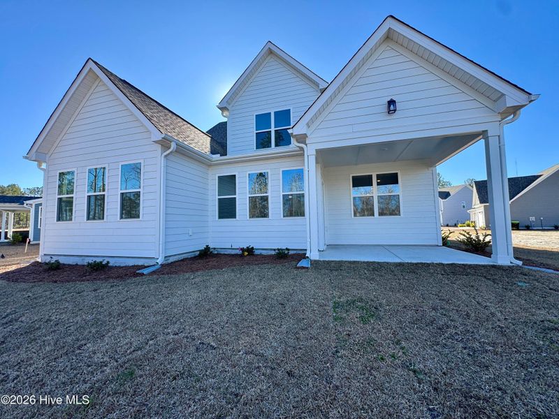 Exterior details and patio area of a home in Terrapin, Leland (Image 3).