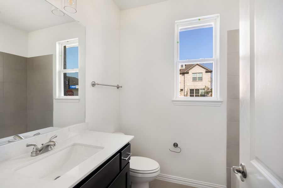 Furnished interior view inside a new home in Edgewater, Fate (Image 14).
