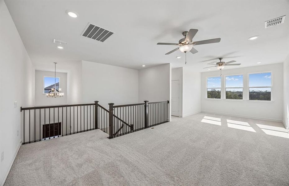 Spacious game room on second floor entry Spacious game room on second floor entry