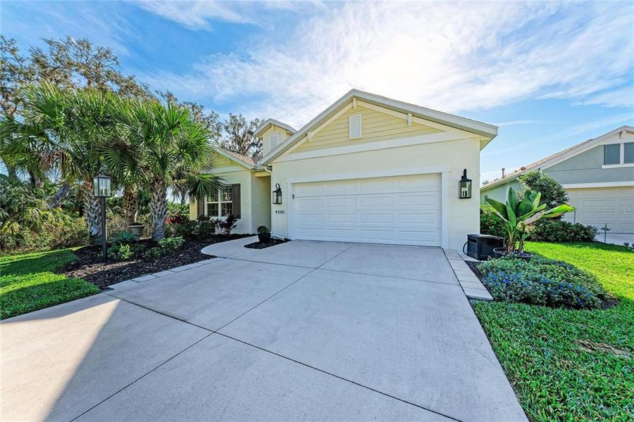 Front exterior of a new home in , Parrish, FL, highlighting curb appeal (Image 28).