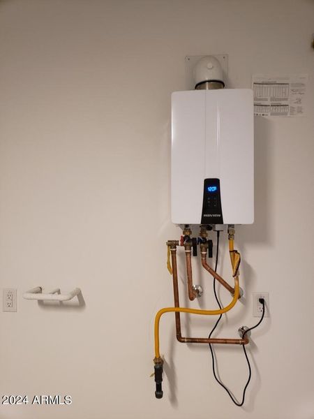 Lot 177- tankless gas water heater and s