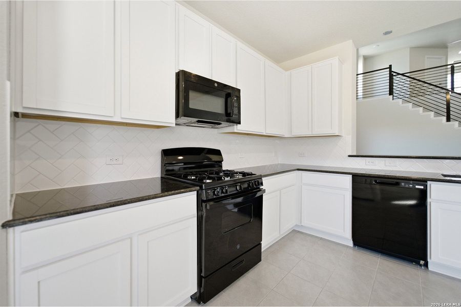 Furnished interior view inside a new home in Hickory Ridge, Elmendorf (Image 4).