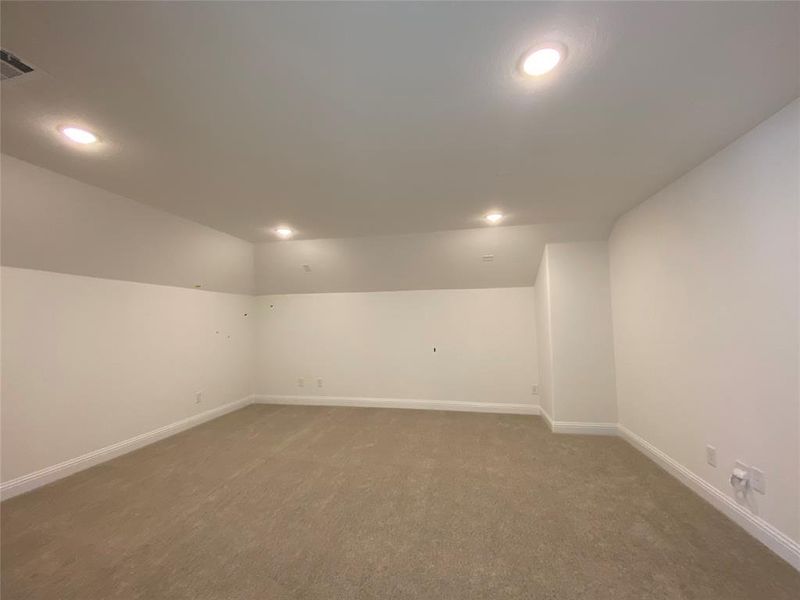 Awesome media room with can lights is prewired for surround sound for gaming or movies! Awesome media room with can lights is prewired for surround sound for gaming or movies!