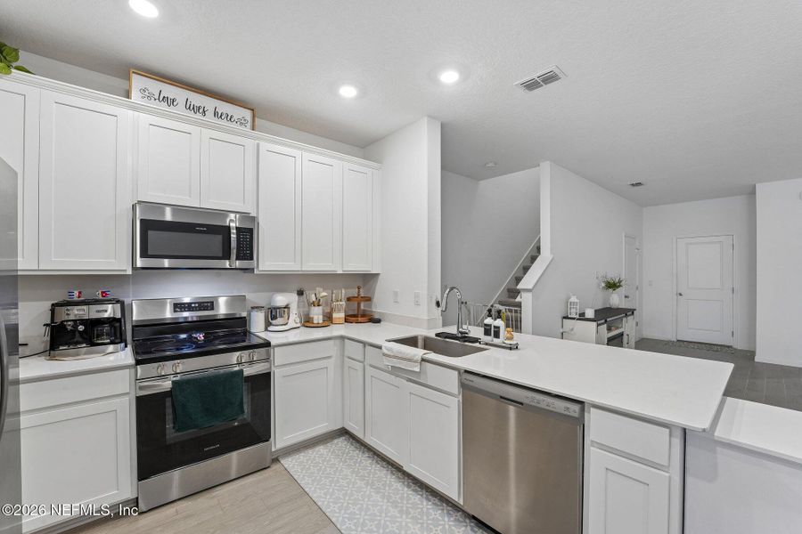 Furnished interior view inside a new home in Longbay Townhomes, Middleburg (Image 18).