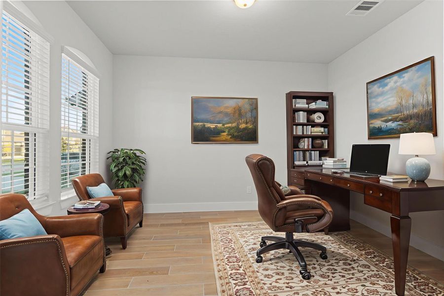 The private Home Office/Study is perfect for working from home, reading, or managing the day’s to-do list. Oversized windows fill the room with light, creating a calm and inspiring workspace with plenty of room for a large desk and shelving. *Staged Photo* The private Home Office/Study is perfect for working from home, reading, or managing the day’s to-do list. Oversized windows fill the room with light, creating a calm and inspiring workspace with plenty of room for a large desk and shelving. *Staged Photo*