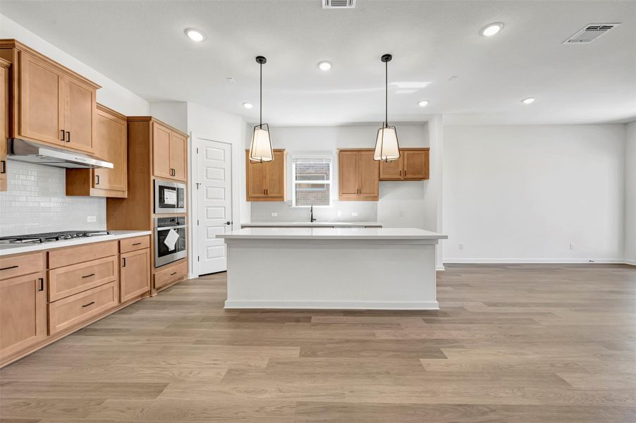 Furnished interior view inside a new home in Heritage, Dripping Springs (Image 12).