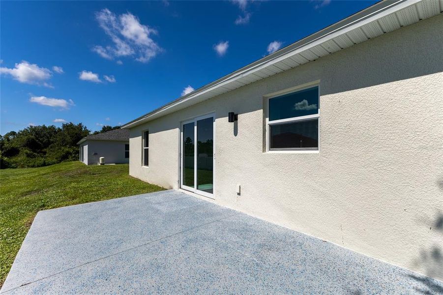 Exterior details and patio area of a home in , Lehigh Acres (Image 4). Exterior details and patio area of a home in , Lehigh Acres (Image 4).