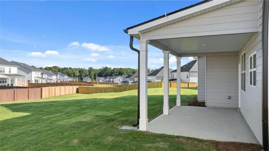 Exterior details and patio area of a home in Independence, Loganville (Image 3).