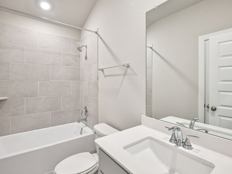 Furnished interior view inside a new home in Riviera Pines - Classic Series, Huffman (Image 5).