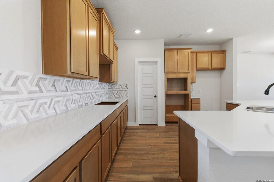 Furnished interior view inside a new home in Alamo Estates, San Antonio (Image 7).
