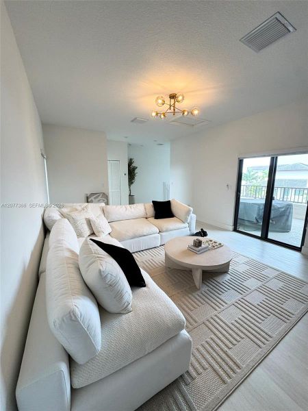 Furnished interior view inside a new home in , Doral (Image 11).