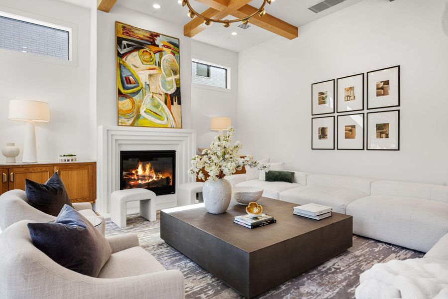 Cozy up next to your gas log fireplace & floating living room built-ins w/ transom windows above. Cozy up next to your gas log fireplace & floating living room built-ins w/ transom windows above.