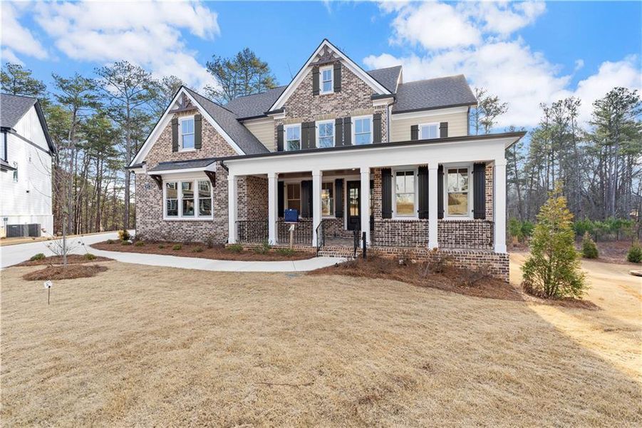 Front exterior of a new home in , Powder Springs, GA, highlighting curb appeal (Image 1). Front exterior of a new home in , Powder Springs, GA, highlighting curb appeal (Image 1).