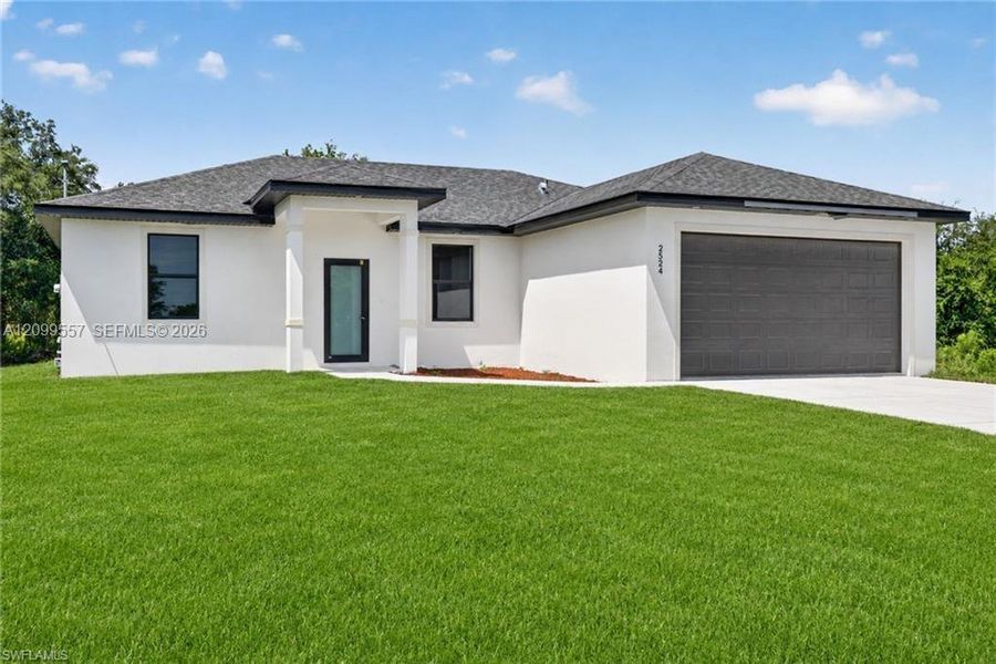 Front exterior of a new home in , Lehigh Acres, FL, highlighting curb appeal (Image 1). Front exterior of a new home in , Lehigh Acres, FL, highlighting curb appeal (Image 1).