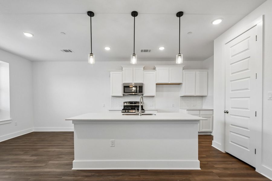 Furnished interior view inside a new home in Center 45, Round Rock (Image 5). Furnished interior view inside a new home in Center 45, Round Rock (Image 5).