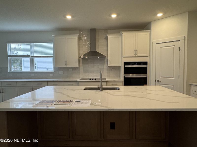Furnished interior view inside a new home in Pirates Bluff, Yulee (Image 4).