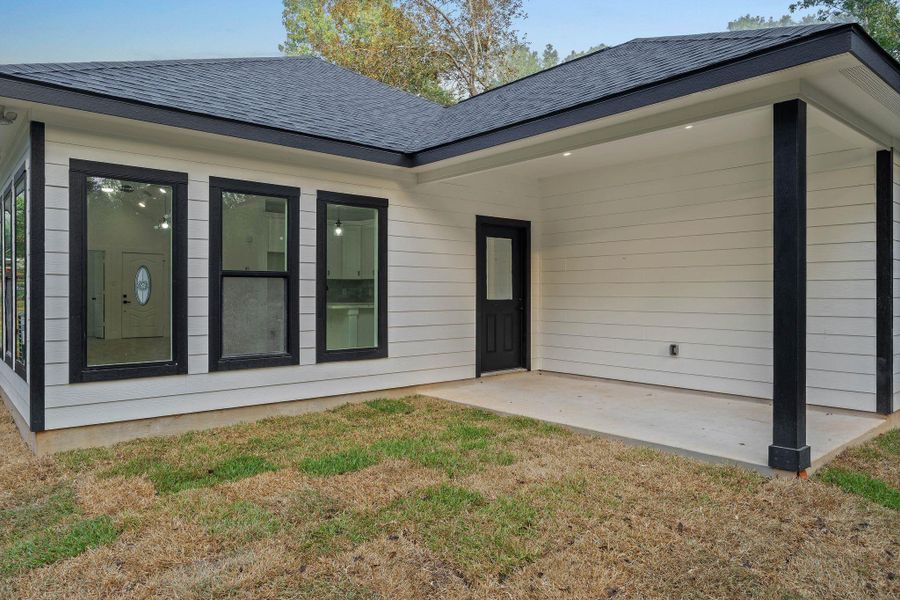 Exterior details and patio area of a home in , Willis (Image 17). Exterior details and patio area of a home in , Willis (Image 17).
