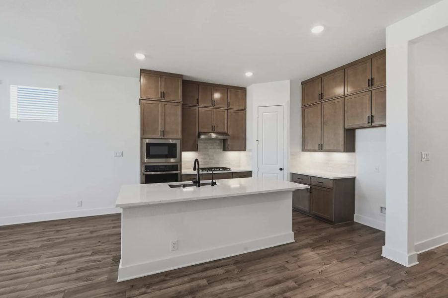 Representative furnished interior of a home built from the Talos by Chesmar Homes in Prominence Urban, San Antonio (Image 5).
