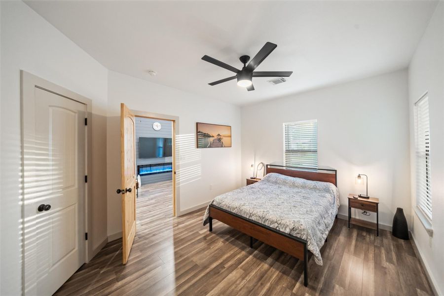 Master bedroom with a walk-in closet and private full bathroom