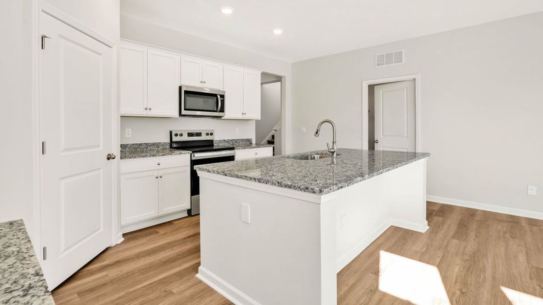 Furnished interior view inside a new home in Grayson Park, Leland (Image 9).