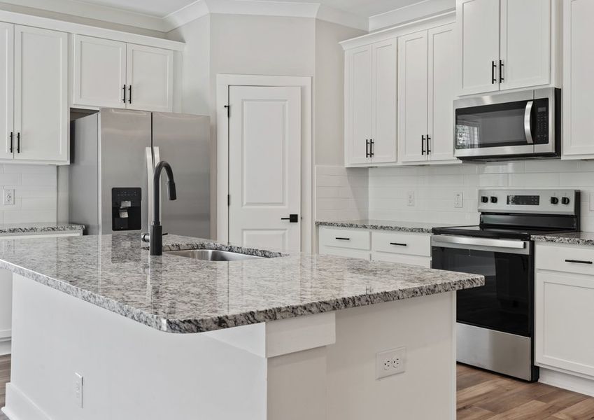 The kitchen has granite countertops